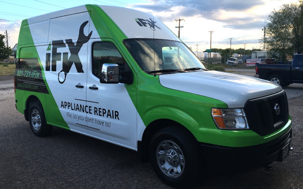 iFiX Appliance Repair technician servicing a home appliance
